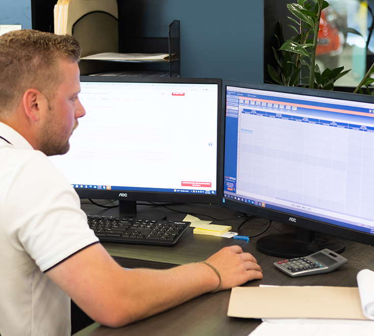 Man using lightspeed software on a computer.